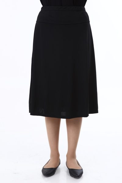 חצאית שחורה צנועה שמנצחת אקונומיקה בסגנון של חצאיות ארוכות מתוך קולקציית בגדי הנוחות ליידיס